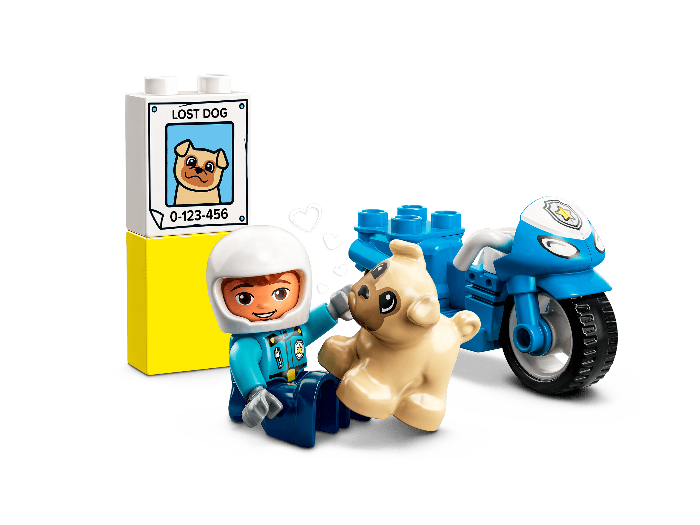 Фігурки поліцейського та собаки поруч із мотоциклом LEGO 10967